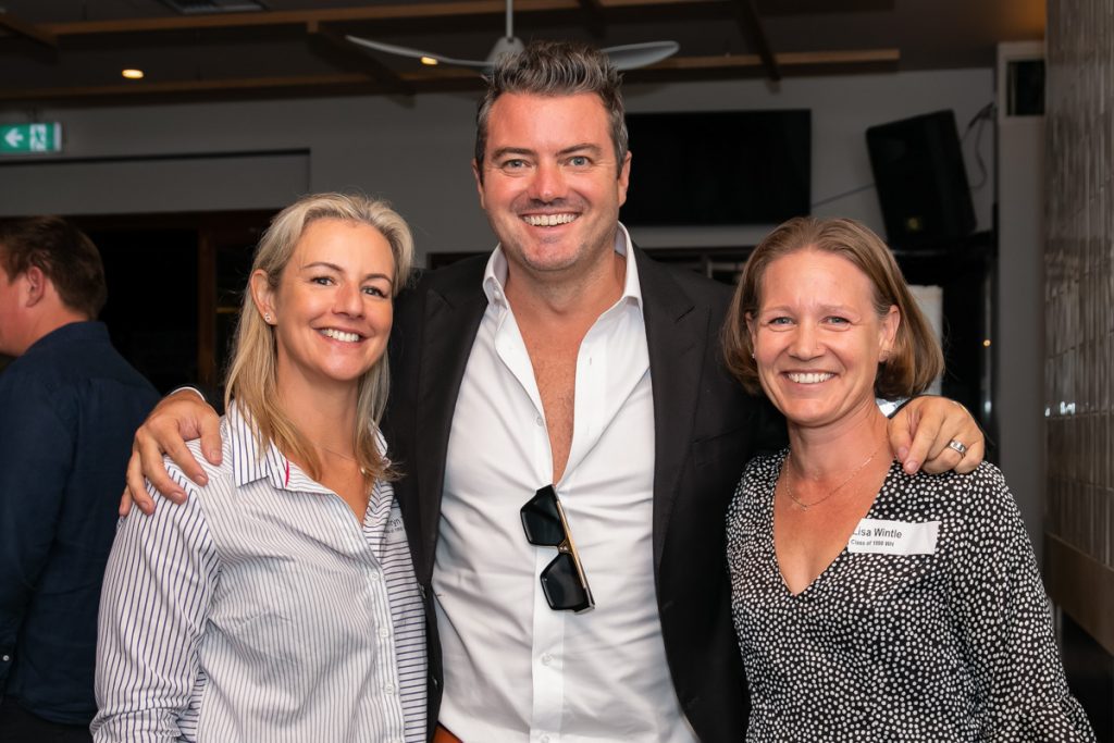 a man and two women standing next to each other at Class of 1998 & 2003 Reunion