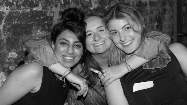 three women are posing for a picture together